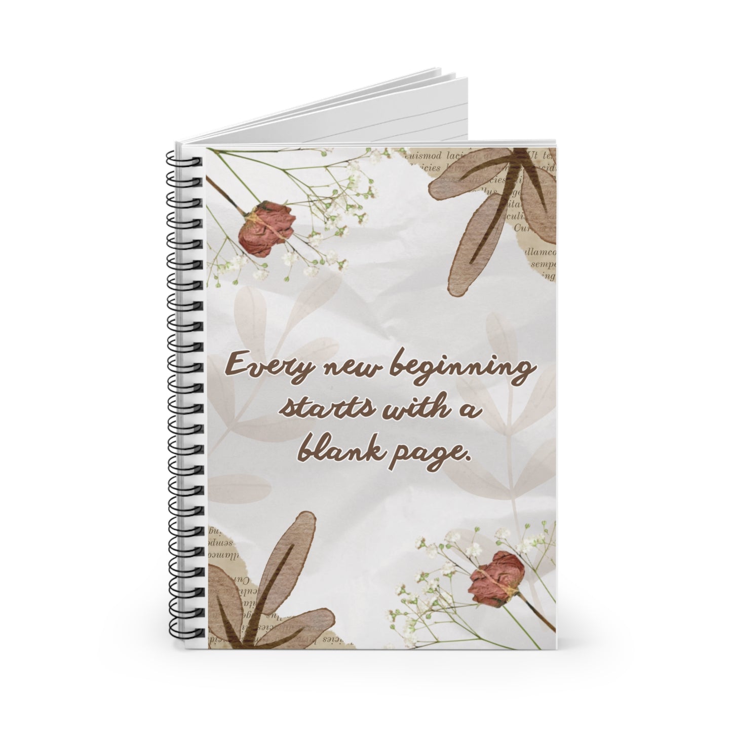 Notebook with floral design and motivational quote on a white background