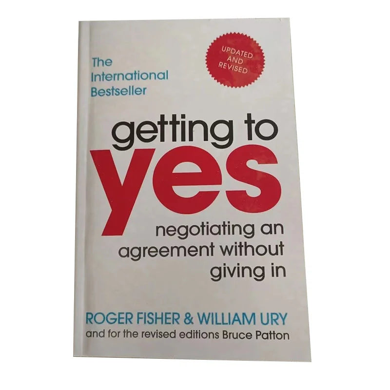 This image features the cover of the paperback book "Getting to Yes: Negotiating an Agreement Without Giving In" by Roger Fisher and William Ury. The book's cover is predominantly white with a bold red title "GETTING TO YES" prominently displayed at the top.