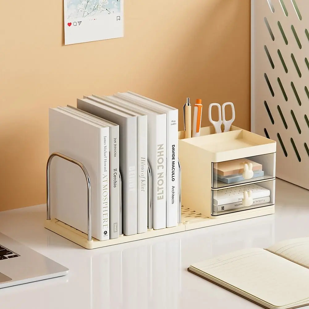 Desk organizer with books and stationery items on a desk.